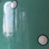 Detailaufnahme weiße Punkte auf grünem Emaille