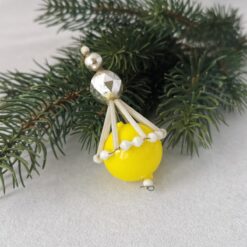 Alter Christbaumschmuck aus Gablonz in Form einer gelben Boje